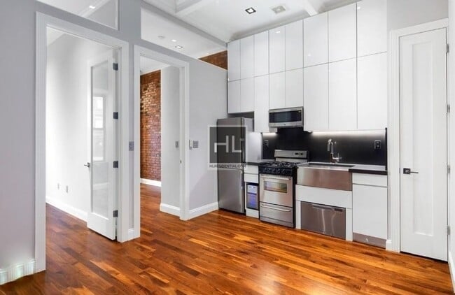 Building Photo - NO FEE West 14th Street and Seventh Avenue 1BR • Sleep Loft • W/D • Elevator • Pets OK