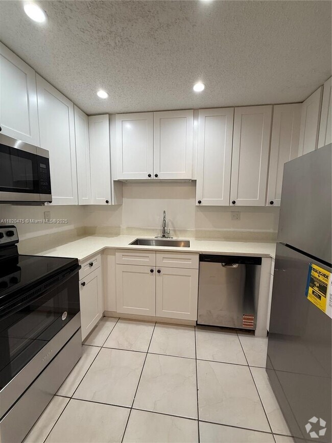 Building Photo - 11392 Royal Palm Blvd