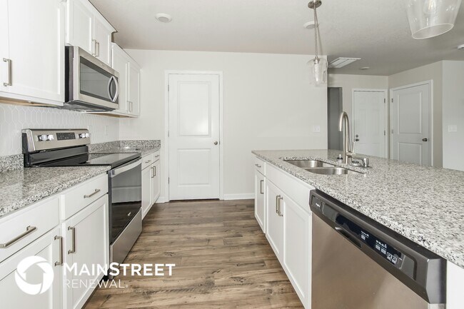 Foto del edificio - 6864 Squirrel Run Ln