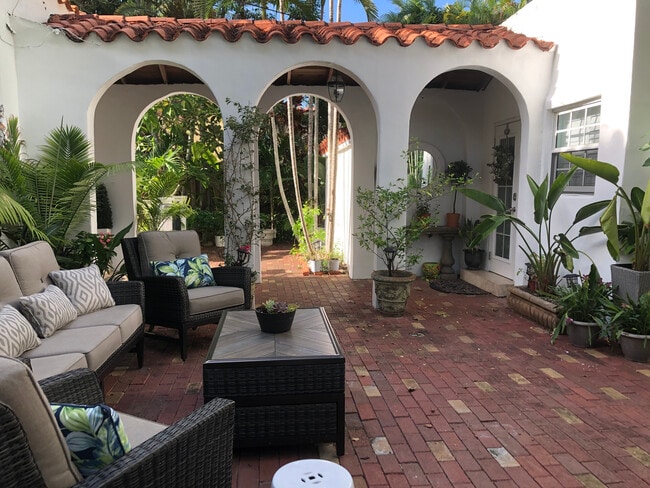 loggia to guest house - 2211 N Bay Rd