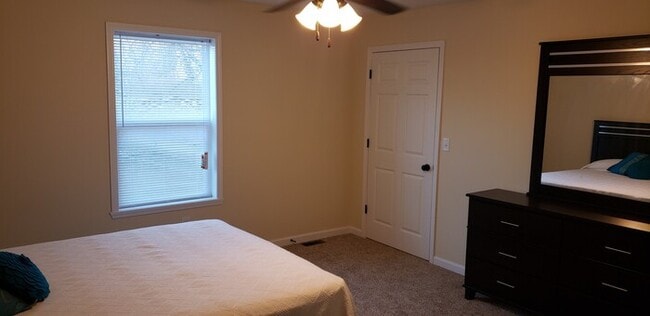 Building Photo - Settle in and cozy up in this comfortable lower-level two-bedroom apartment.