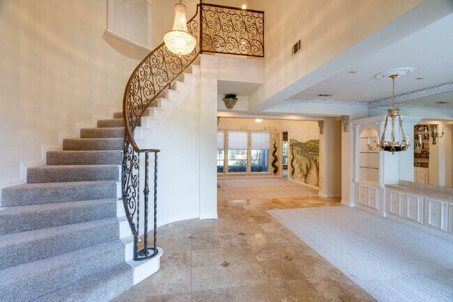 Building Photo - "Stately Gated 5-Bedroom Estate With Pool, Custom Details & Abundant Living Space!"
