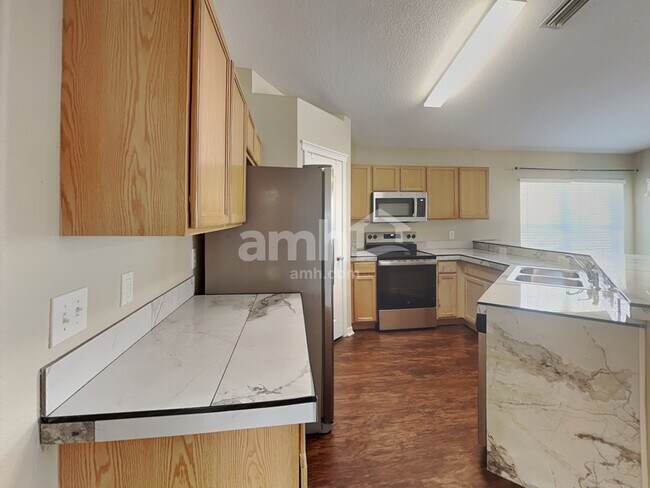 Foto del edificio - 5831 Wrenwater Dr