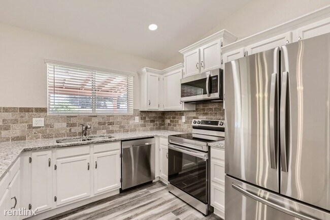 Building Photo - 4 br, 2 bath House - 8009 W Desert Cove Av...