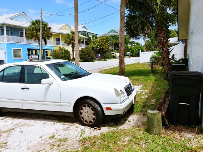 Off street parking and trash area - 703 S Daytona Ave