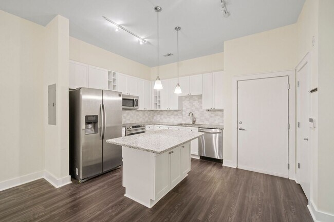 Foto del edificio - Modern 1BR/1BA in First Ward – Walk to Parks, Dining & Entertainment