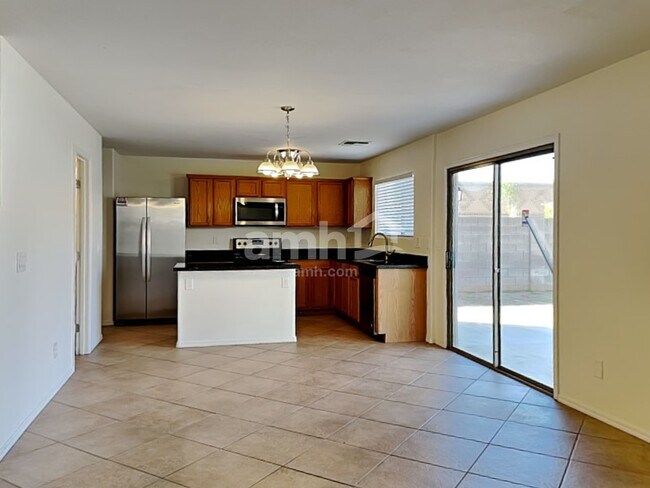 Building Photo - 8850 E Posada Ave