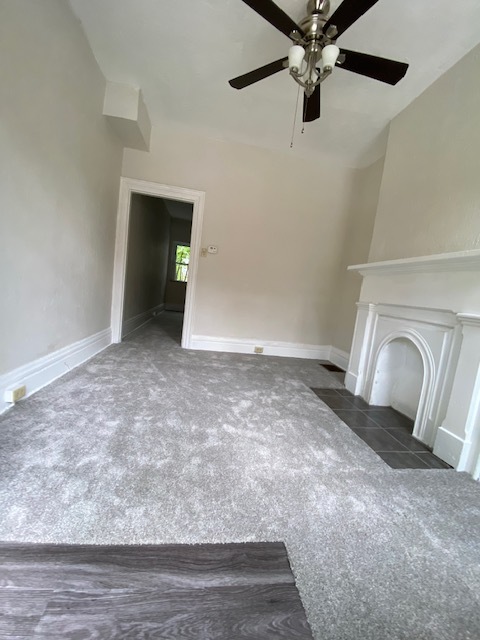 Living room with new carpet - 126 45th St