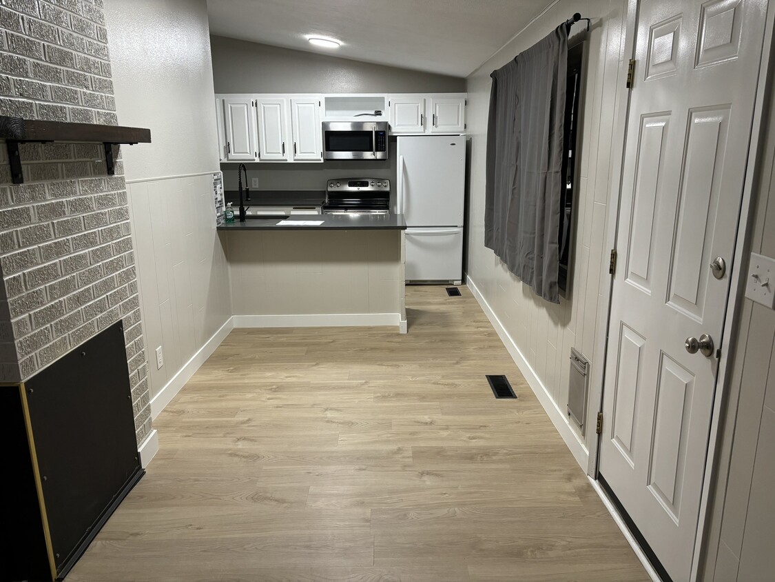 Dining area inside front door - 1504 W 7th Pl