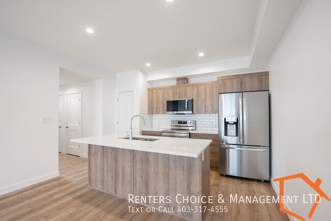 Building Photo - NEW 2 BEDROOM LOWER LEVEL SUITE WITH ASSIGNED PARKING
