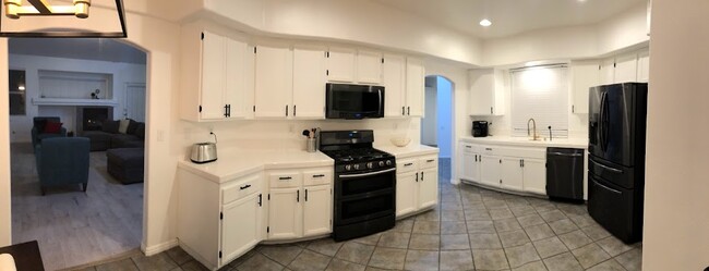 Kitchen fully equipped with appliances, cookware, and silverware for making meals at home a breeze. - 15860 Alisa Viejo Ct