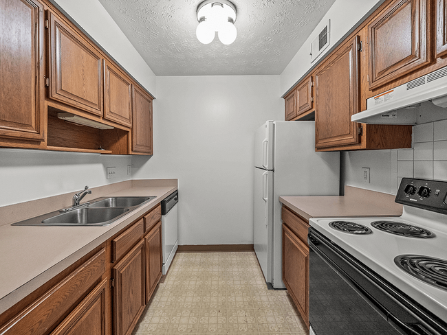 Fully-Equipped Kitchen - Cedarwood Village Apartments