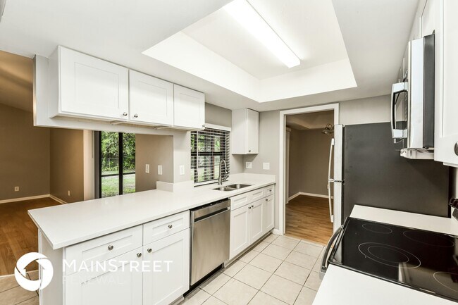 Foto del edificio - 8445 Winged Foot Dr