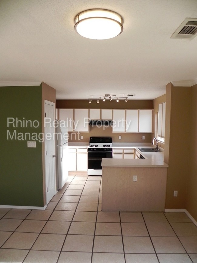 Building Photo - 1338 Ojo Sarco St SW