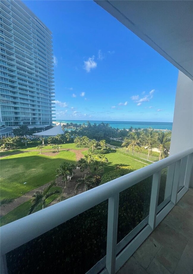 Building Photo - 10275 Collins Ave
