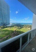 Building Photo - 10275 Collins Ave