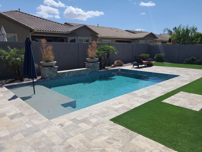 Building Photo - Pristine Luxury Rental: Stunning 4-Bed, 2....
