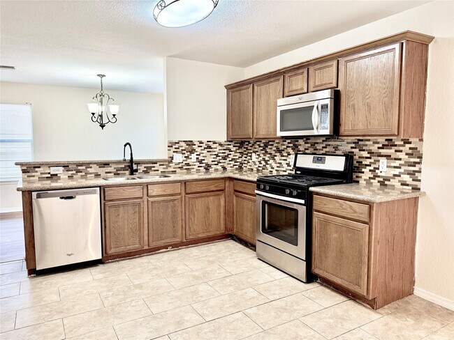 Foto del edificio - 3814 Silver Bridge Ln