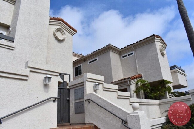 Foto del edificio - Charming 3-Bedroom Condo in the Heart of L...