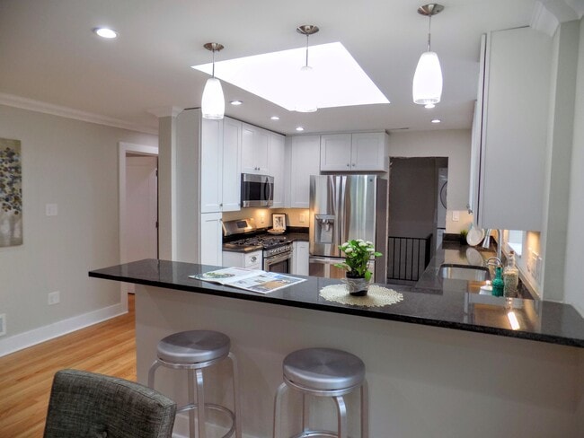 Kitchen peninsula and Skylight - 7547 Delmar Blvd