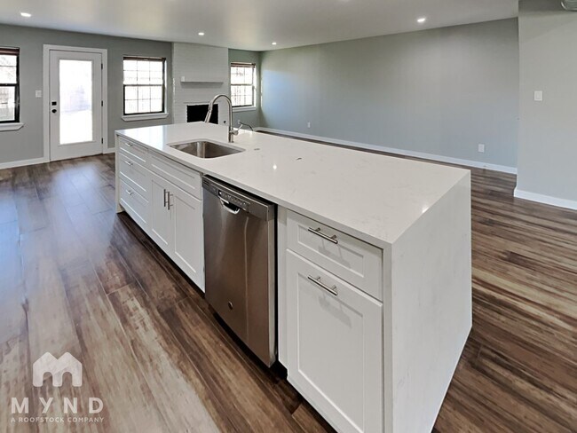 Building Photo - 6102 Bullard Dr APT A