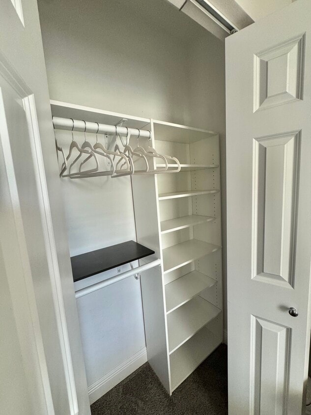 Closet with built in shelves & stands - 2208 E 15th Ave