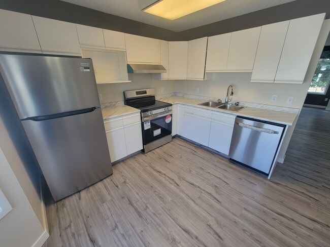 Building Photo - 8006-815A 15a Ave NW