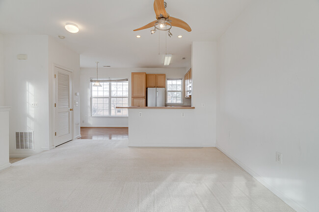 Living room into kitchen - 23176 Blackthorn Sq