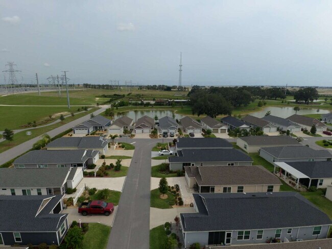Building Photo - Furnished Rental with Golf Cart Included!