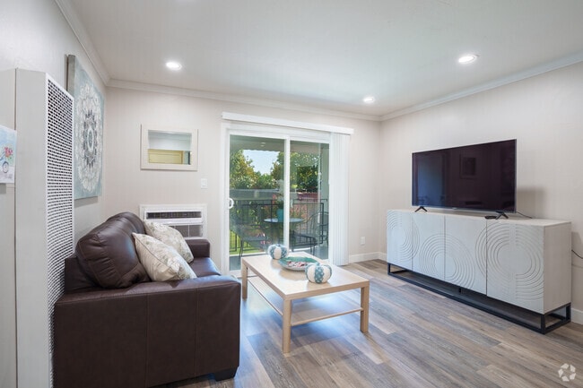 1BR, 1BA - Plan B - Living Room - 888 Golden Fortune