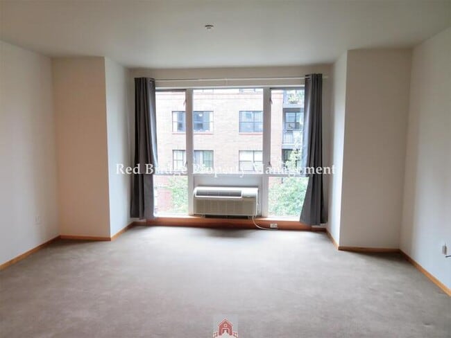 Building Photo - Pearl Condo Ready Now