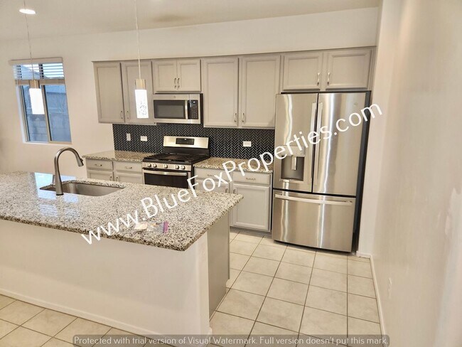 Building Photo - 10897 W Sarabella Dr