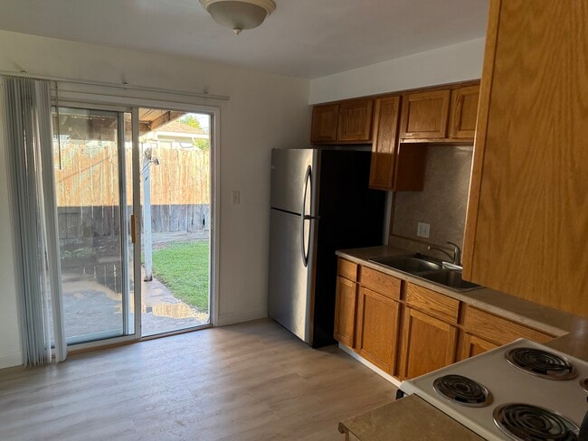 Kitchen includes refrigerator - 614 S Lower Sacramento Rd
