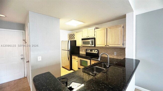 Building Photo - 1760 Palm Cove Blvd