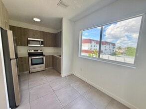 Building Photo - 1295 W 69th St