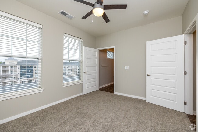 2BR, 2BA - 1423 SF - Primary Bedroom - Bonavia at Withers Farm