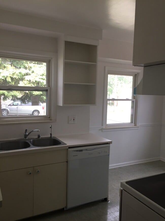Building Photo - A Charming 3 Bedroom Bungalow, Hardwood Floors, Fenced in Backyard