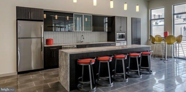Building Photo - Chic Loft-Style 1-Bedroom Oasis in the Hea...