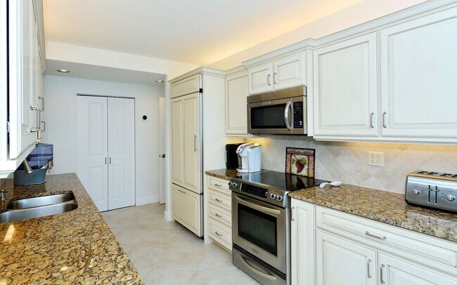 Building Photo - Seasonal Rental - Private Beachfront Retre...