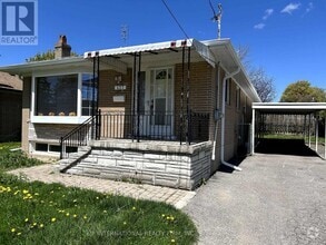 Building Photo - 437 Paliser Crescent N
