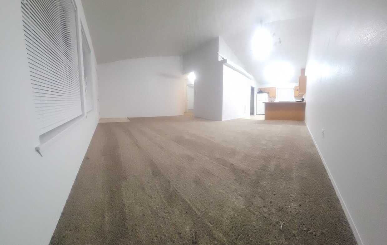 Living room looking in kitchen - 803 N 20th Ave