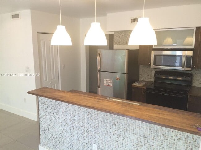 Photo - 7025 Rue Granville 1 1, Miami Beach, FL 33141 House