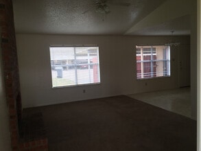 Building Photo - 9007 Woodgate Cir E