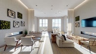 Located at 850 Pacific Street in Stamford, Connecticut, this sophisticated single-floor amenity space exemplifies contemporary design with an emphasis on natural light and refined materials. Expansive floor-to-ceiling windows flood the interiors with sunlight and frame panoramic views of the surrounding cityscape, creating a bright and airy atmosphere throughout.

The spacious lounge area serves as the heart of the space, featuring generously arranged seating with neutral-toned sofas and organic wood accent pieces, including a striking live-edge tree stump coffee table. A sleek linear fireplace anchors one wall, topped by a large flat-screen display and complemented by curated botanical art panels. Sheer floor-to-ceiling drapery defines zones while maintaining an open, flowing layout.

A well-appointed kitchenette boasts a marble-look countertop, integrated sink, subway tile backsplash, and open wood shelving styled with decorative accents. Woven bar stools complete the casual counter seating.

Additional areas include a sun-drenched lounge nook with rattan furniture positioned directly against the glass curtain wall, a spacious open flex area with direct outdoor terrace access, and a connecting corridor with tile flooring and glass partitions. A dramatic wood-paneled living wall adorned with lush greenery and blooms adds a vibrant natural focal point to the interior.