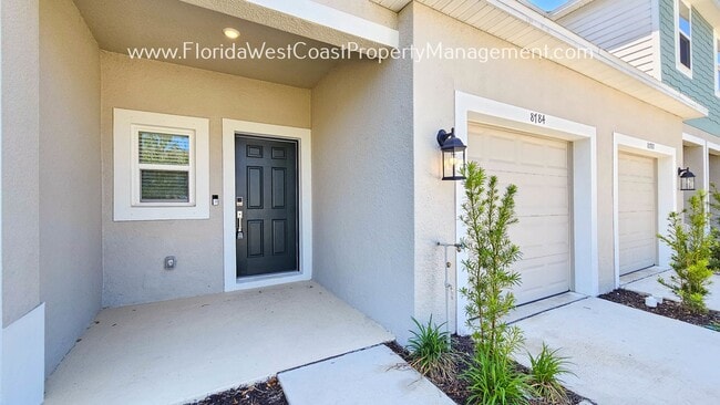 Building Photo - OUTSTANDING BRAND NEW TOWNHOME! SKYE RANCH...