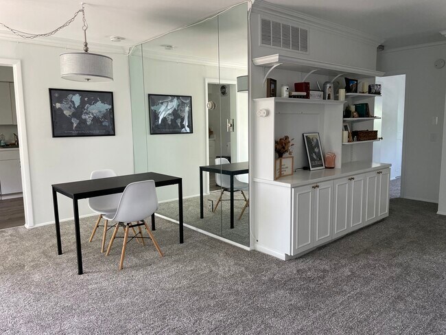 Dining Area and Entertainment Center - 369 Homeland Southway