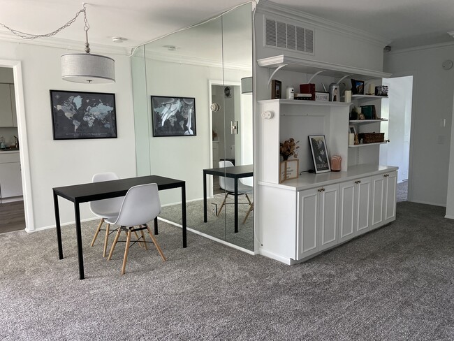 Dining Area and Entertainment Center - 369 Homeland Southway