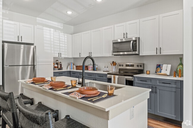 2BR, 2BA - 1,048SF - Kitchen - Enclave Creedmoor