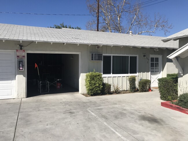One car garage attached - Woodbury Manor Apartments