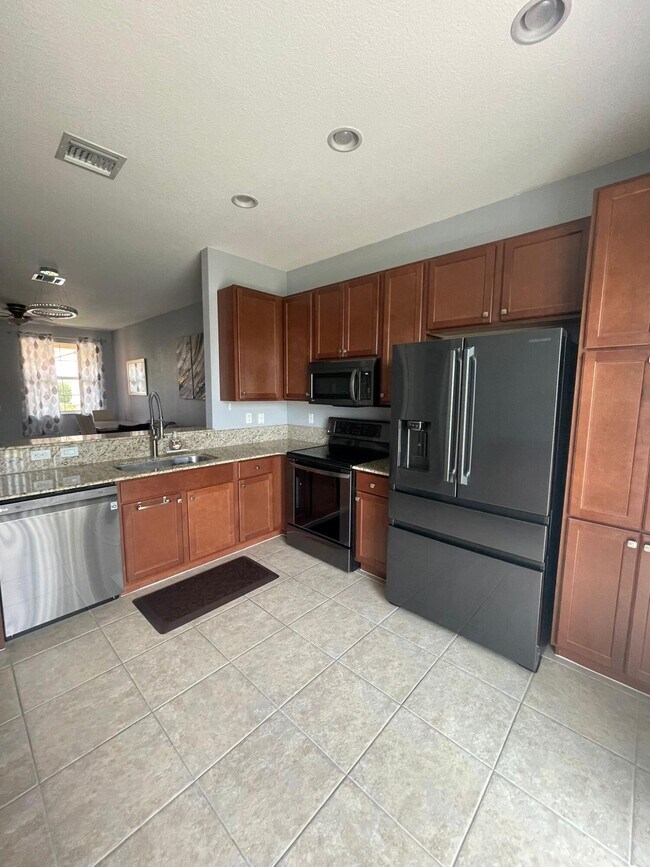 Building Photo - 7445 Sarentino Ln